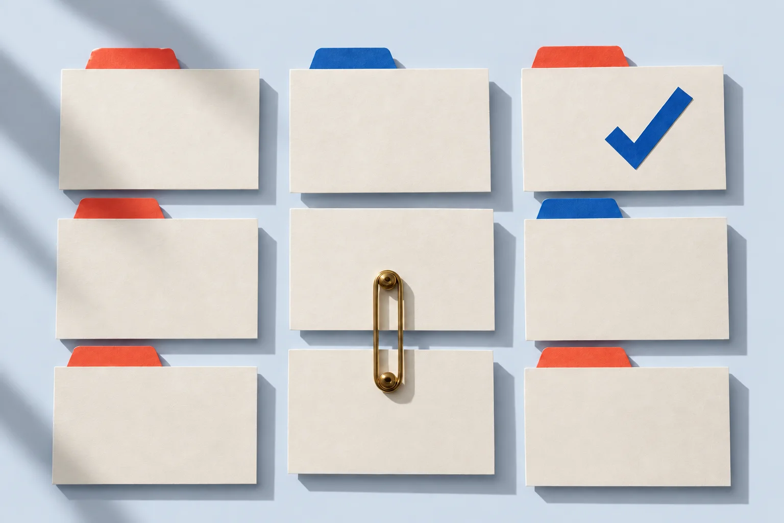 Concept image : Paper task cards, colored tabs and a blue check mark