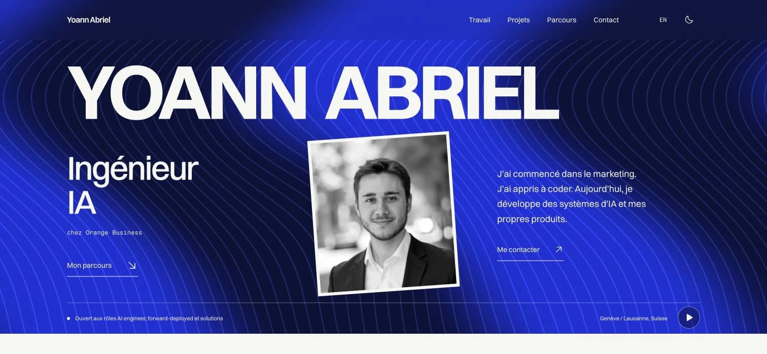 Portfolio home page: Yoann Abriel's name, photographic portrait and personal introduction over an electric-blue background with curved lines