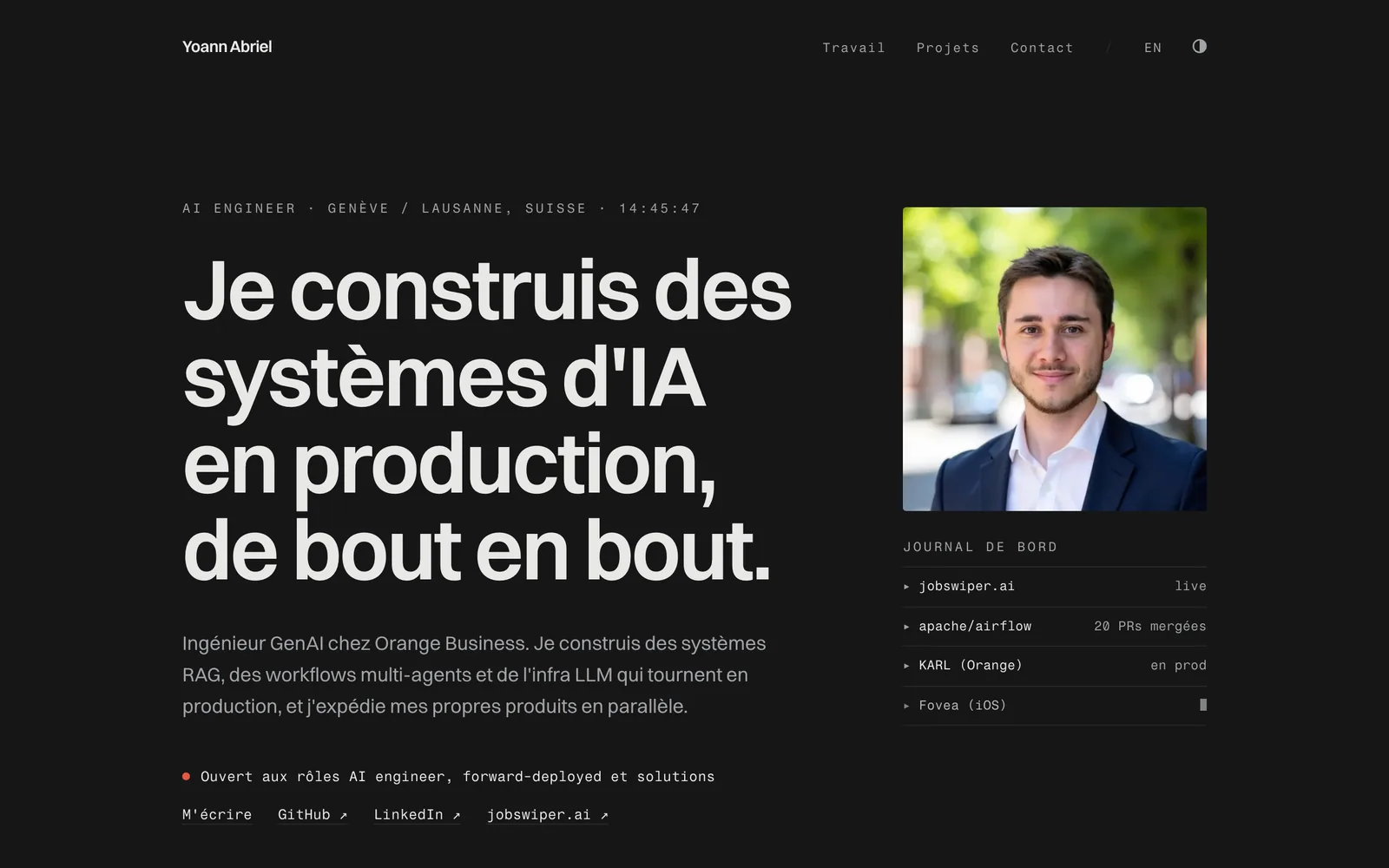 The same home hero in dark mode: light text on a black background, mono column on the right.