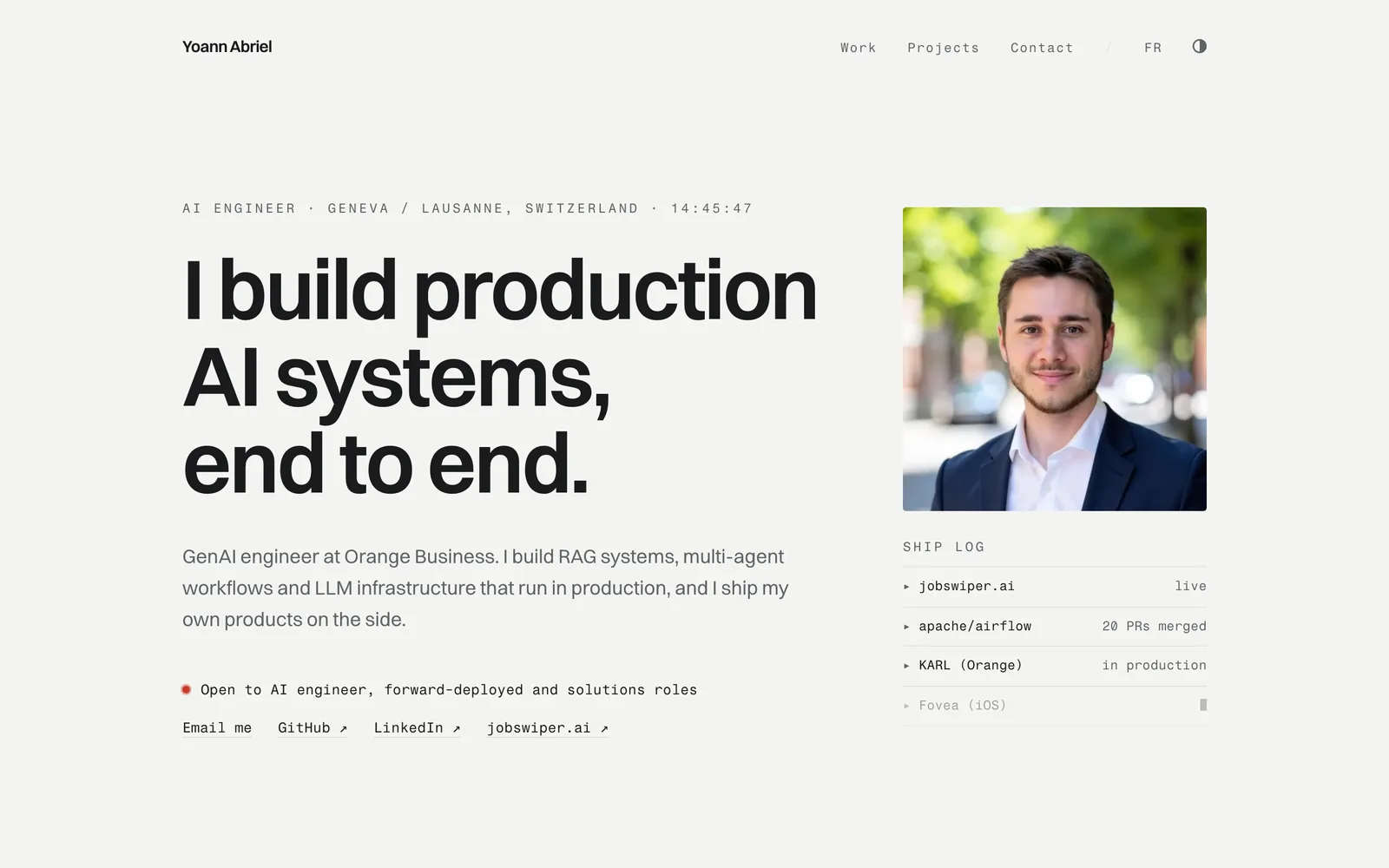 Hero of the English home page: I build production AI systems, end to end, with the Ship log column.